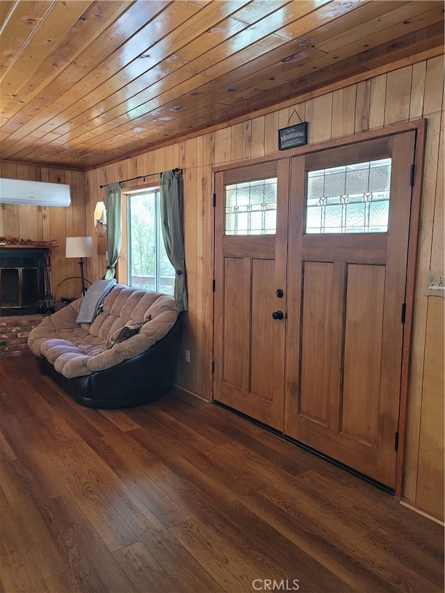 entrance foyer with wood ceiling, wooden walls, dark wood-type flooring, and a wall mounted air conditioner