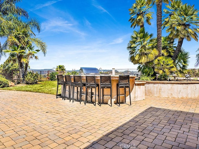 view of patio / terrace with a bar