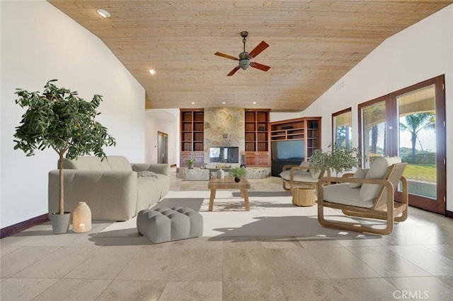 interior space with ceiling fan, french doors, and wooden ceiling