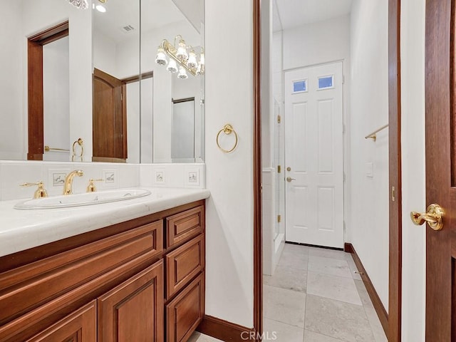 bathroom featuring tile patterned floors and vanity