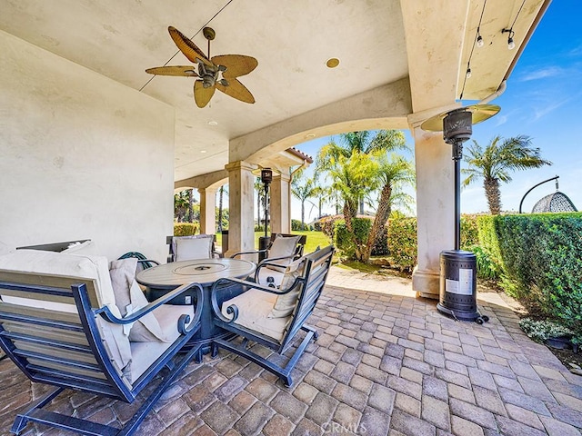 view of patio / terrace with ceiling fan