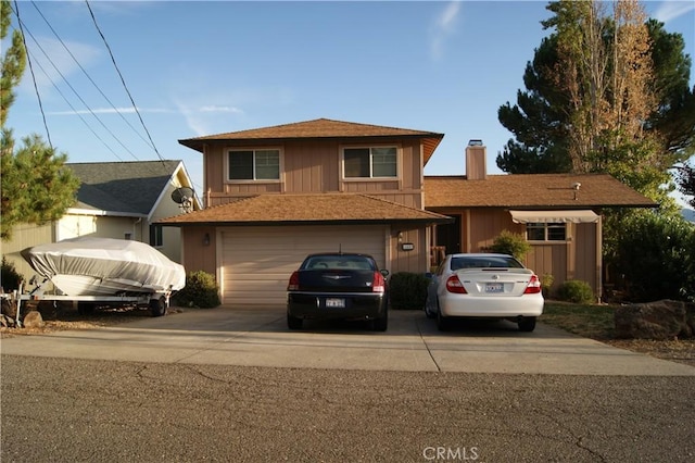 view of front of property featuring a garage