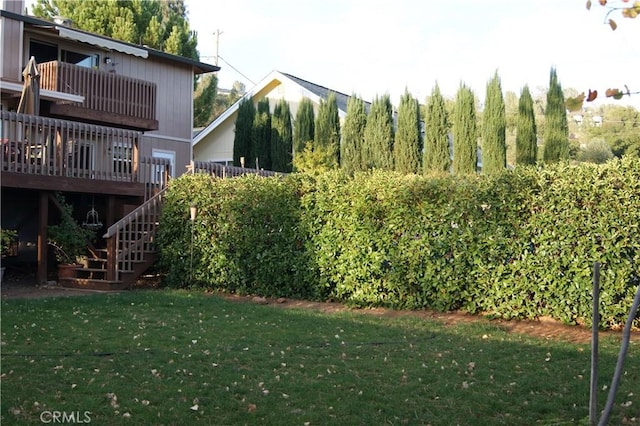 view of yard with a deck