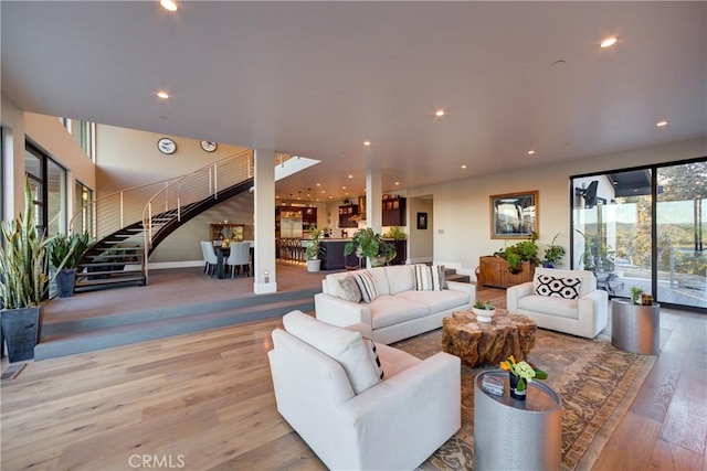 living room with light hardwood / wood-style floors