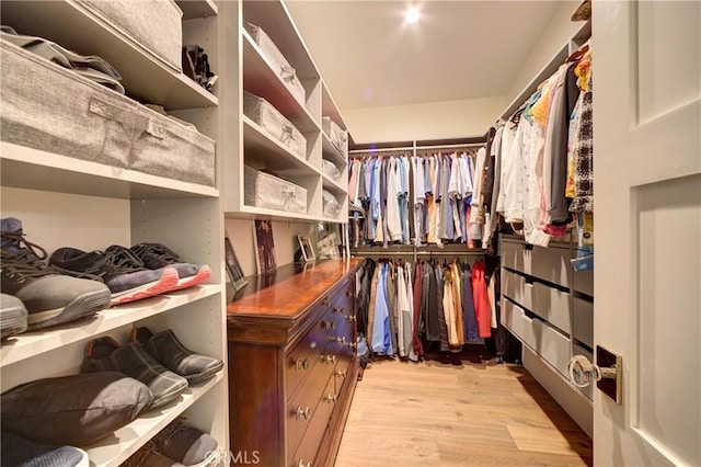 walk in closet featuring light hardwood / wood-style floors