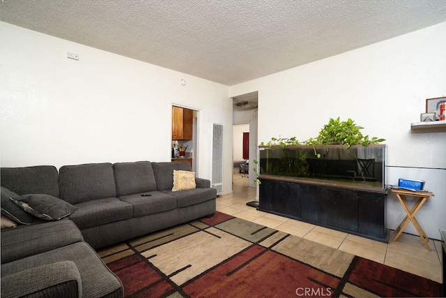 tiled living room with a textured ceiling