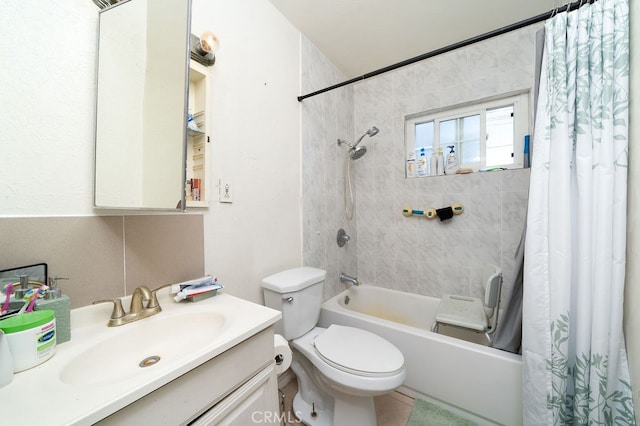 full bathroom with tile patterned flooring, shower / bath combo, vanity, and toilet