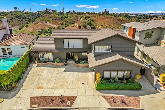 view of front of home with a patio