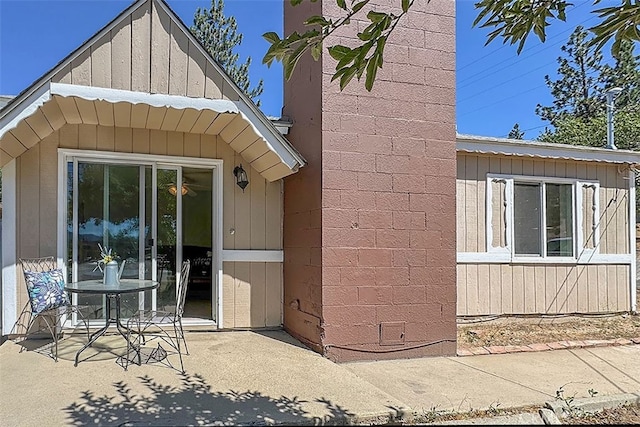 view of side of property featuring a patio area