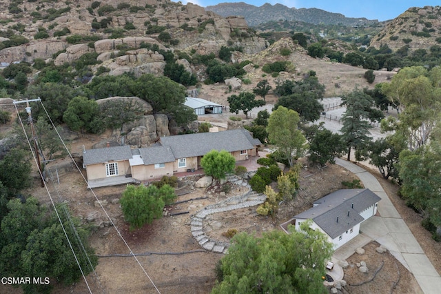 drone / aerial view featuring a mountain view