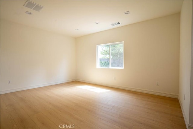 empty room featuring light wood-type flooring