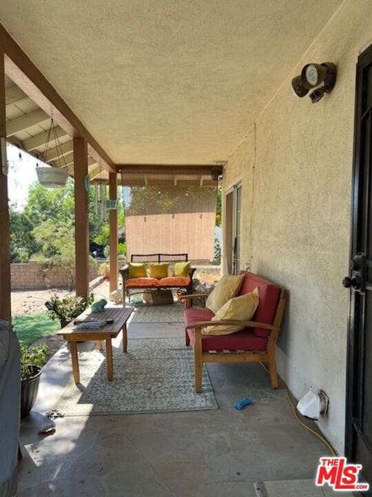 view of patio with an outdoor hangout area