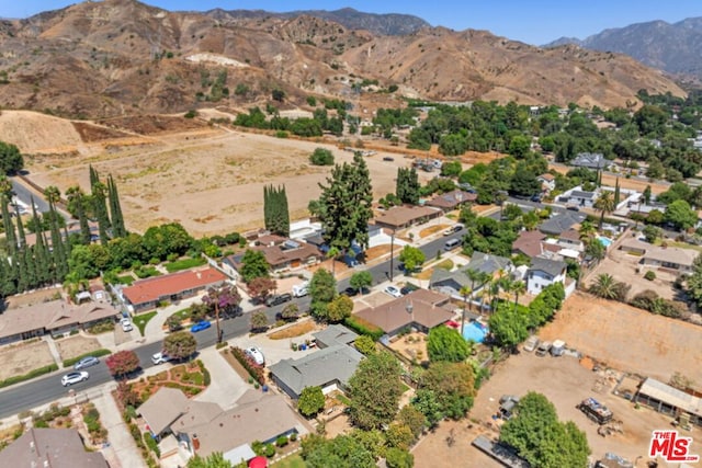 aerial view featuring a mountain view