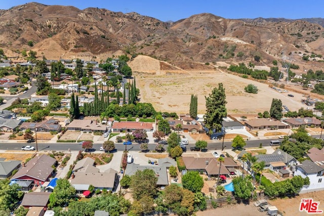 bird's eye view with a mountain view