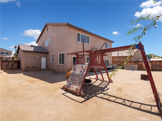 rear view of property with a patio area