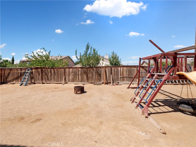 view of yard with a playground