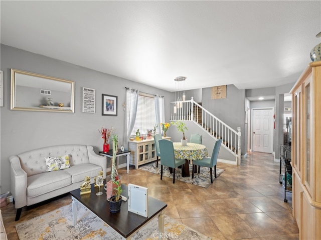 living room featuring tile patterned flooring