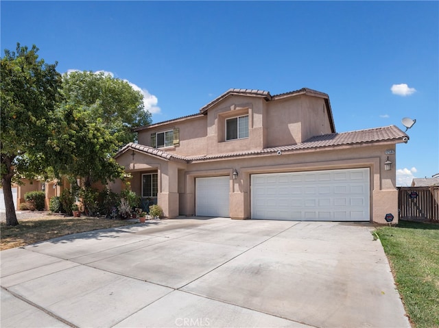 mediterranean / spanish-style home with a front yard