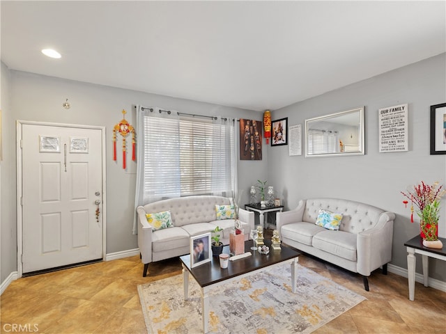 living room featuring light tile patterned floors