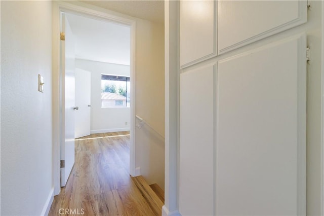 hallway featuring light hardwood / wood-style floors