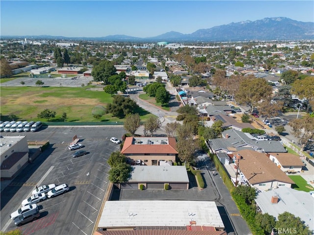 drone / aerial view featuring a mountain view