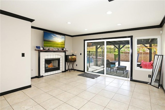 unfurnished living room with crown molding, a fireplace, and light tile patterned floors