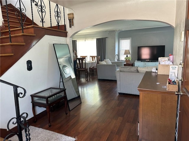 living room featuring dark hardwood / wood-style floors