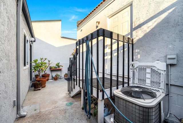 view of patio with central air condition unit