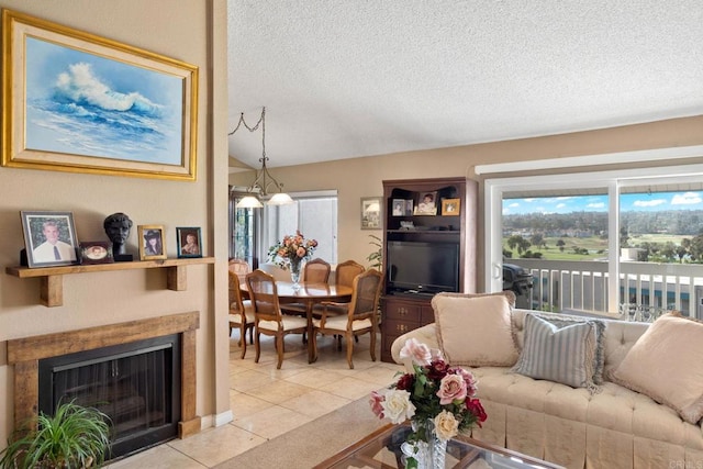 tiled living room featuring lofted ceiling and a textured ceiling