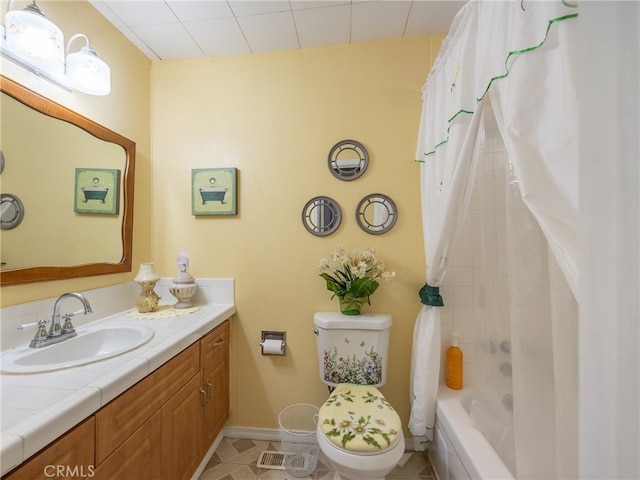 full bathroom with vanity, toilet, tile patterned floors, and shower / bath combination with curtain