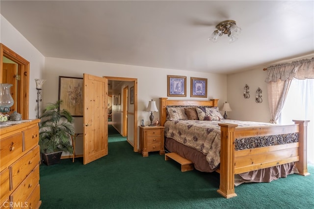 bedroom featuring dark colored carpet