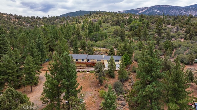 birds eye view of property featuring a mountain view