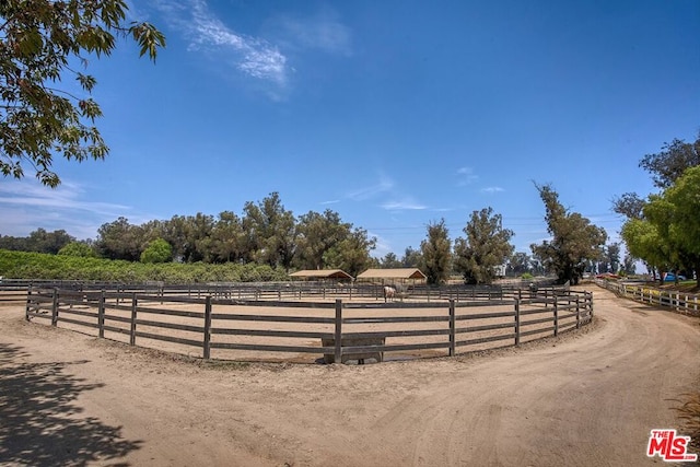 exterior space with a rural view