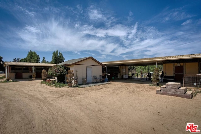 view of front facade with an outdoor structure