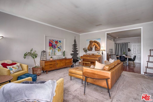 living room with light hardwood / wood-style floors and ornamental molding