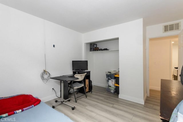 office area with light wood-type flooring