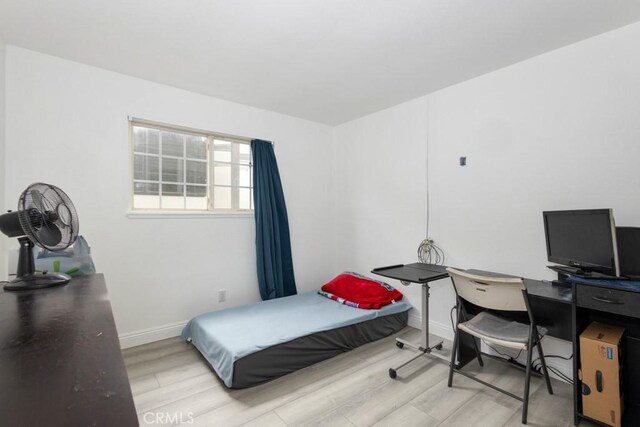 bedroom featuring light hardwood / wood-style floors