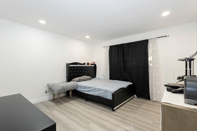 bedroom featuring light hardwood / wood-style flooring