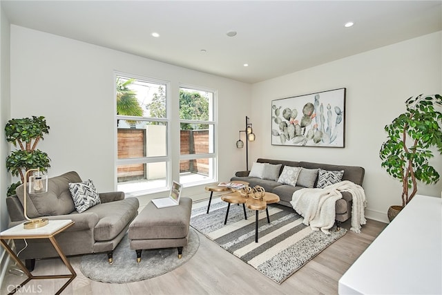 living room with light hardwood / wood-style floors