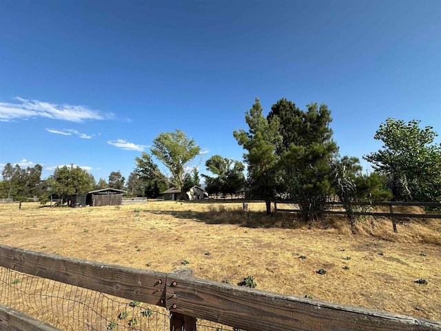 view of yard featuring a rural view