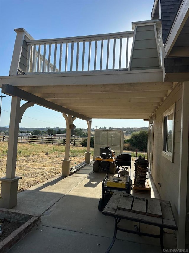 view of patio with a rural view