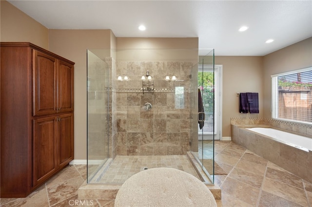 bathroom featuring plus walk in shower