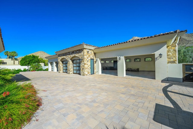 view of front of property with a mountain view