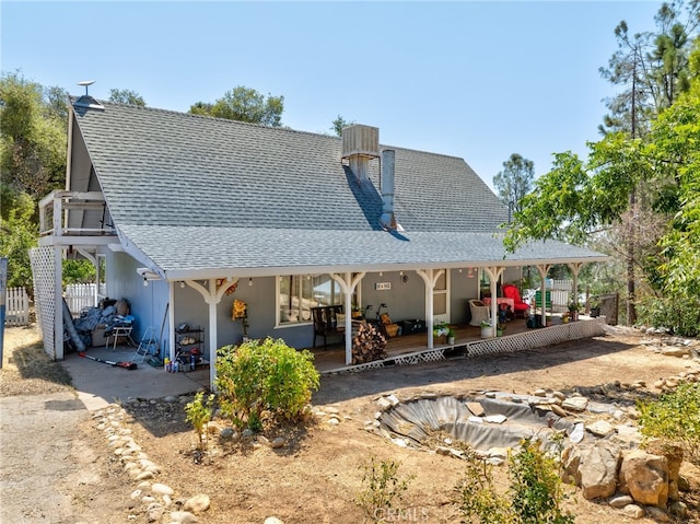 rear view of property featuring a patio area