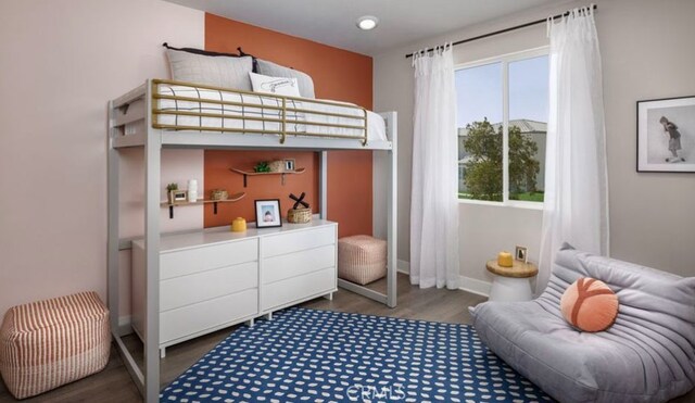 bedroom featuring dark wood-type flooring