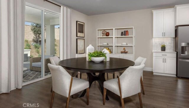 dining space featuring dark wood-type flooring