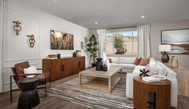 living room with dark hardwood / wood-style floors