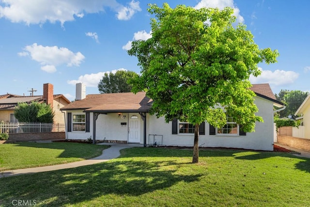 view of front of property with a front lawn