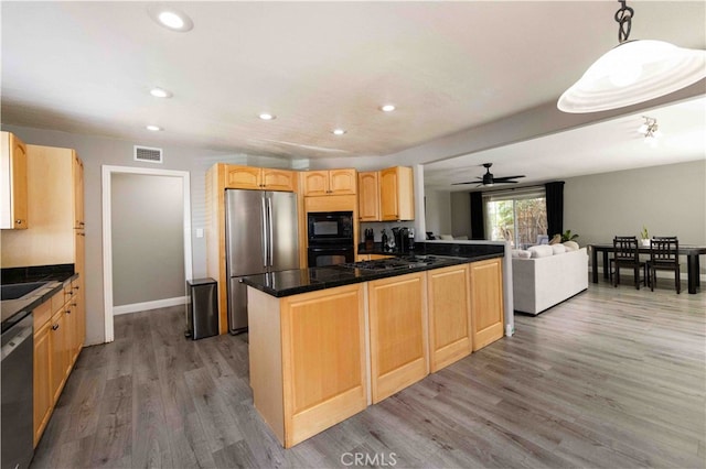 kitchen featuring light brown cabinets, pendant lighting, black appliances, ceiling fan, and hardwood / wood-style floors