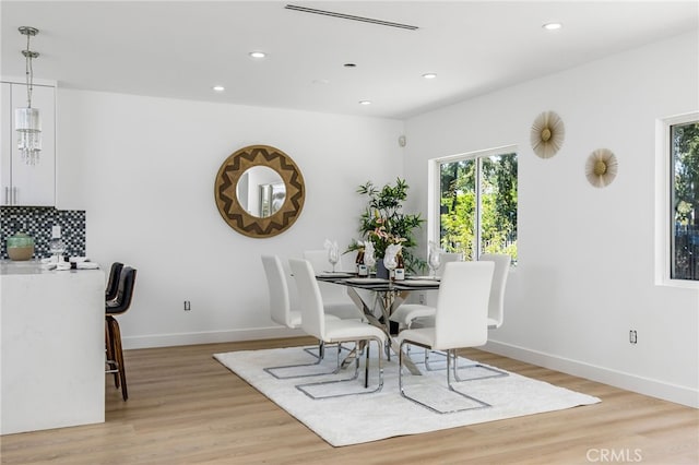 dining room with light wood-type flooring